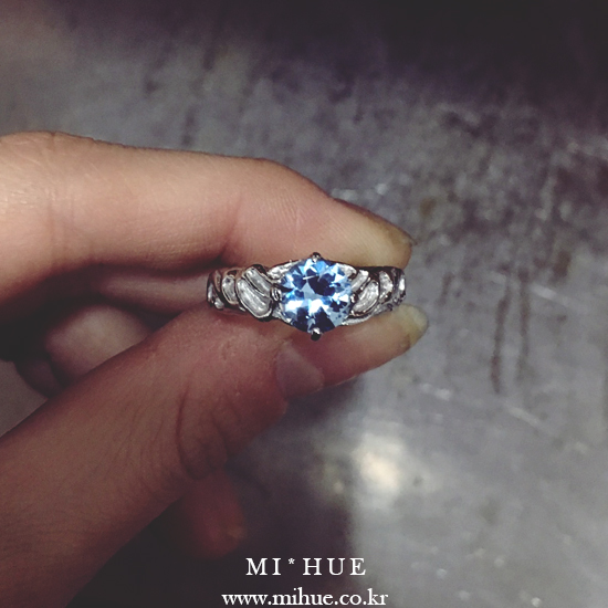 Crescent silver ring with aquamarine